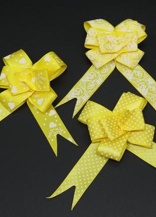 Бант подарунковий стрічковий на затяжках для пакування подарунків і декору колір жовтий. 5х8 см1 фото