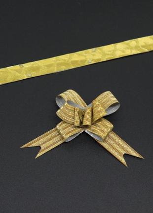 Подарунковий бант-затяжка поліпропіленовий для декору колір золотистий.2 фото