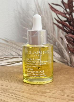 Оригінал масло для обличчя для жирної шкіри clarins lotus face oil treatment1 фото