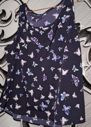 Блузка з метеликами