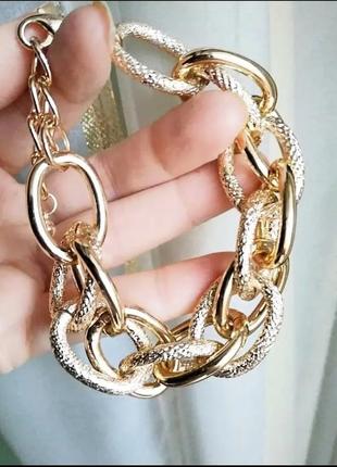 Широкий браслет на руку золото