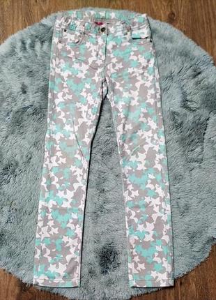 Стильні джинси в зірочки для дівчинки 8-9 р.