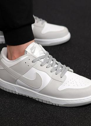 Чоловічі шкіряні, сірі з білим, стильні кросівки nike dunk low. від 40 до 44 рр. 5662 кк демісезонні