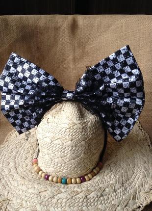 Це не вуха... відштовхувальний бант-обруч на волосся для зрілих і сміливих дам.