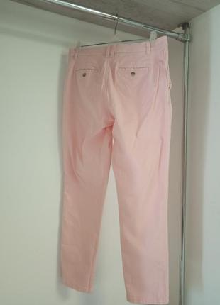Розовые брюки