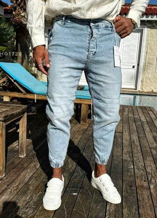 Чоловічі джинси з манжетами1 фото