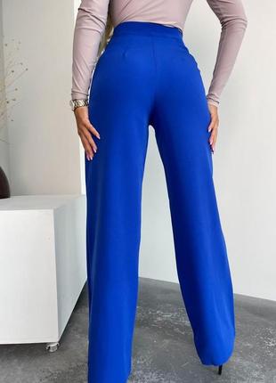 Элегантные женские брюки из костюмной ткани4 фото