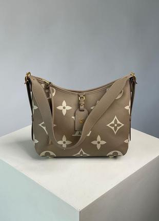 Сумка у стилі louis vuitton carryall pm bicolor monogram empreinte leather beige2 фото