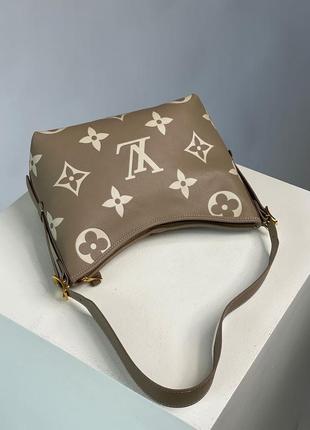 Сумка у стилі louis vuitton carryall pm bicolor monogram empreinte leather beige4 фото