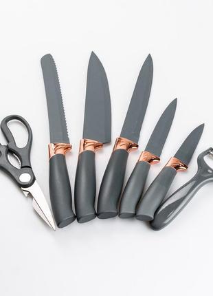Набор кухонных ножей 5 штук с ножницами и овощечисткой на подставке черный8 фото