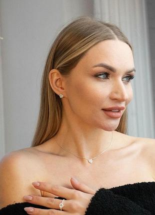 Срібні сережки-гвоздики в формі серця з фіанітами