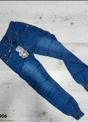 Легкі джинси для дівчинки.2 фото