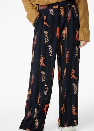 Брюки з леопардами палацо monki xs боді у подарунок