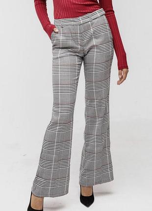 Класичні штани кльош у клітинку