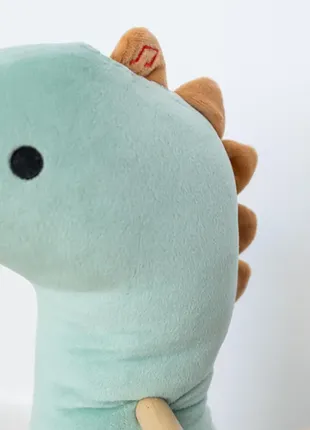 Качеля с сиденьем музыкальная 68 х 20 х 73 см. до 30кг , freeon dino бирюзовый 41402 фото