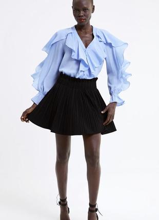 Блуза з воланами