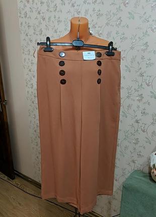 Брюки капри