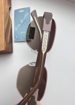 Фирменные солнцезащитные безоправные очки rita bradley polarized rb90262 фото