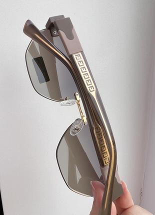 Фирменные солнцезащитные безоправные очки rita bradley polarized rb90266 фото
