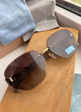 Фирменные солнцезащитные безоправные очки rita bradley polarized rb90265 фото