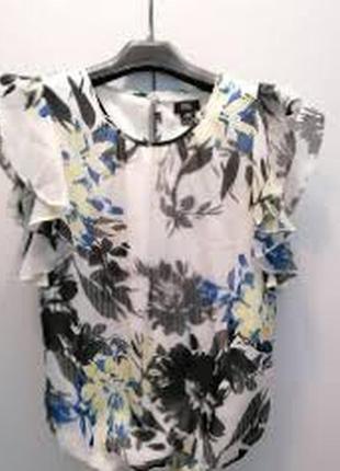 Блузка з квітами
