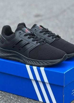 Кроссовки adidas.