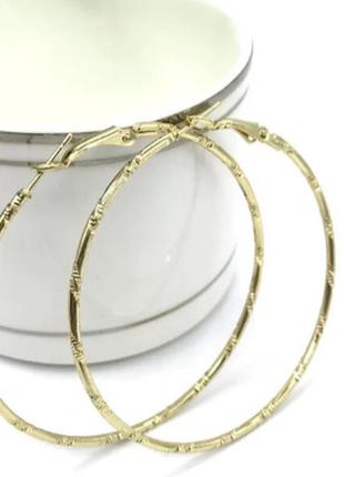 Серьги бижутерия "кольца"2 фото