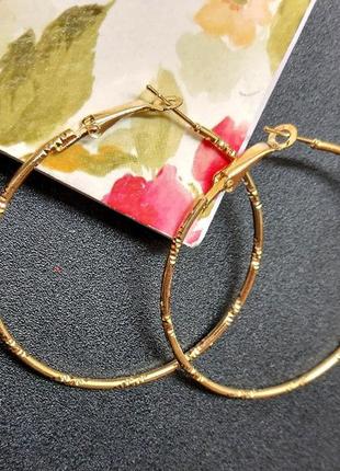 Серьги бижутерия "кольца"3 фото