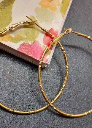 Серьги бижутерия "кольца"5 фото