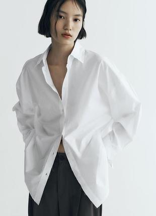 Біла поплінова сорочка оверсайз з необробленими краями zаrа