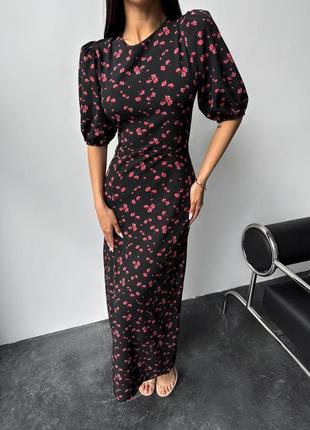 Гарна якісна сукня максі силуетного  крою у квітковий принт з розрізом на нозі та короткими рукавами4 фото