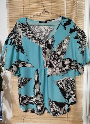 Штапельна блузка з вільними рукавами