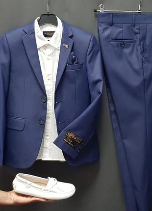 Шкільні костюми сині paulo carvelli