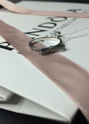 Серебряное кольцо кольца пандора pandora 190906cz мерцающий бант бантик с камнями камнем серебро проба s925 ale новое с биркой и пломбой