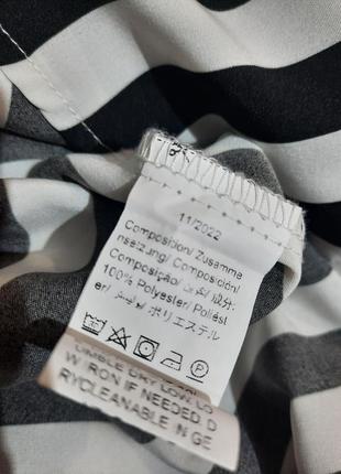 Стильна сукня міді в смужку4 фото