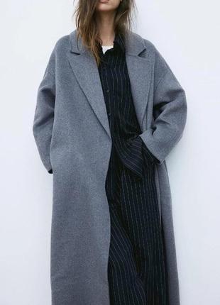 Шикарное длинное пальто прямого кроя с поясом1 фото