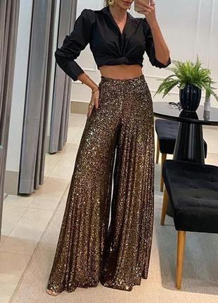 Clothes штани кльош паєтки.