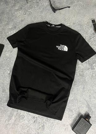 Футболка north face чорна з принтами на спині