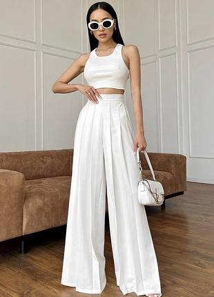 Жіночі брюки палаццо з високою посадкою молочні
