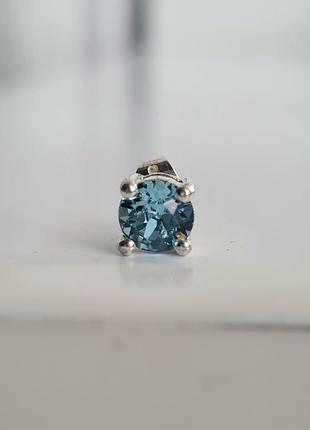 Нові срібні блакитні сережки-гвоздики glimmering з кристалами swarovski + мішечок
