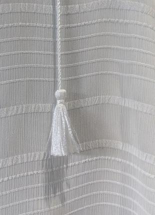 Напівпрозора блуза вільного крою з китичками3 фото