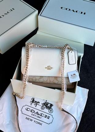 Сумка coach mini klare crossbody in signature canvas in light khaki/snake5 фото