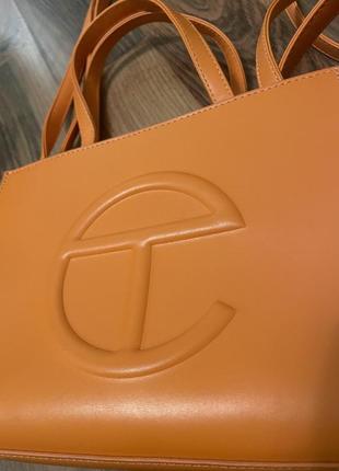 Трендовая оранжевая сумка среднего размера4 фото