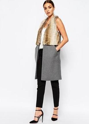 Подовжена стильна желетка