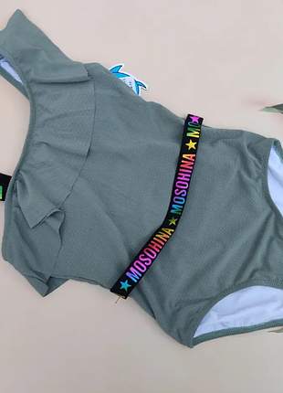 Дитячий і підлітковий суцільний купальник у рубчик на одне плече з воланом teres 964-2 шт.