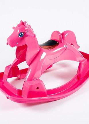 Детская качалка лошадка розовая пластиковая долони, см. описание1 фото