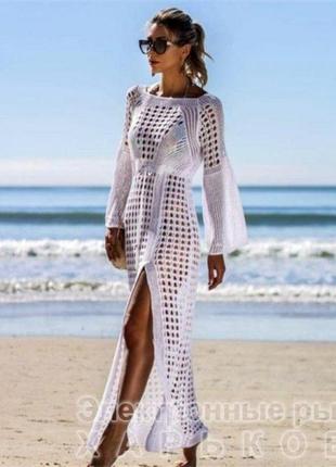 Платье. новое ,приятной на ощупь ажурной ткани. свободный крой .сейчас в тренде. спереди розрез, вещь,как на модели.