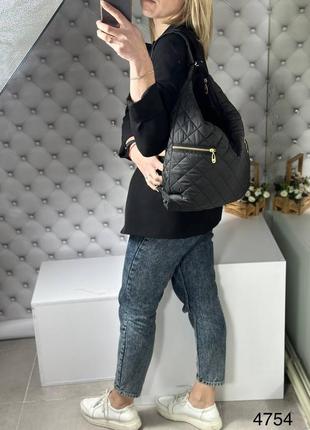 Женская стильная и качественная сумка рюкзак из стеганой плащевки черная2 фото