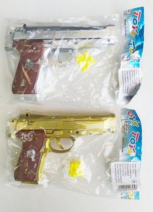 Іграшковий пістолет на кульках арт.7572 фото