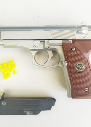 Іграшковий пістолет на кульках арт.7574 фото